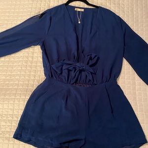 Royal blue romper with a little peekaboo- worn once